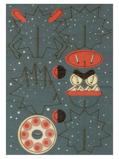 Large monster wooden craft kit with pre-coloured laser-cut birch plywood sheet and instructions.