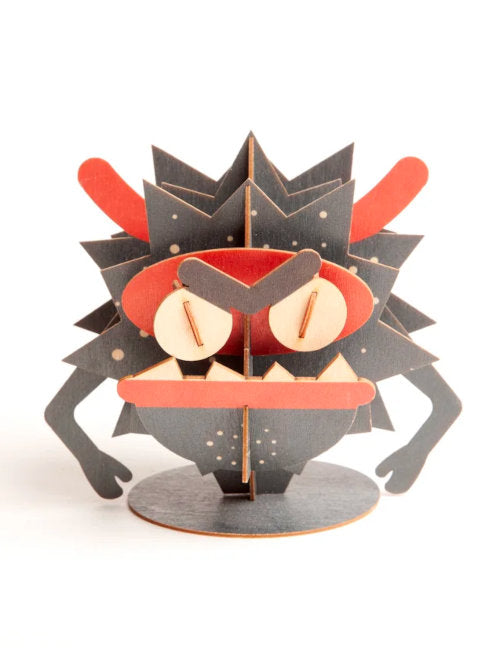 Completed large monster wooden craft kit assembled as a colourful monster decoration.