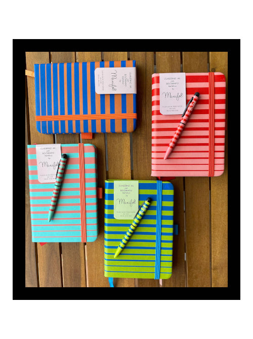 Selection of A6 striped notebooks in different colour combinations, each with a matching metallic pen and elastic closure