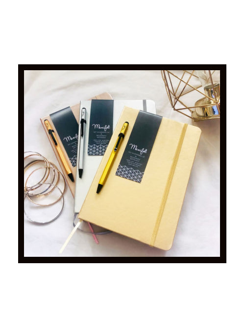 Metallic finish A5 notebooks with matching ballpoint pens displayed together in gold, rose gold and silver