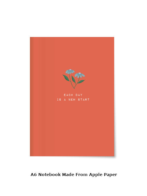 Orange-Red A6 notebook with floral design and text "Each Day Is A New Start" on the front. Made from Apple Paper. 