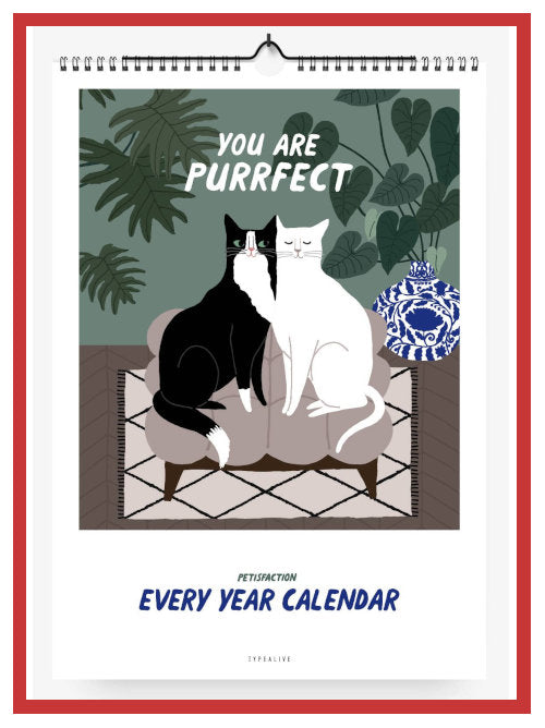 Illustrated wall calendar cover showing two cats sitting together with the text YOU ARE PURRFECT EVERY YEAR CALENDAR