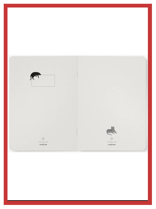 Open notebook showing mostly blank pages with small cat illustrations