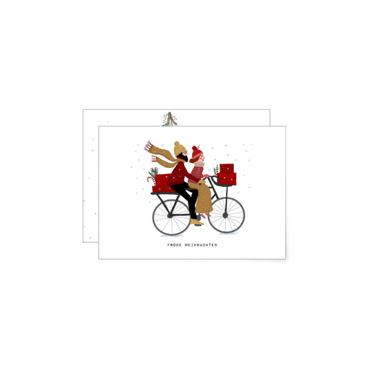 A beautifully illustrated christmas card featuring a couple riding a bike in the snow carrying christmas gifts and the German words "frohe weihnachten"