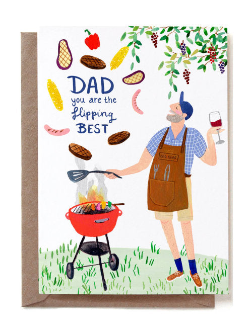 This is a colourful Father's Day greetings card showing dad grilling and flipping the food in the air. It's bright and funny and has the words "Dad you are the flipping best". 