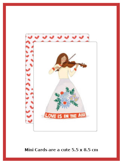 Mini greetings card with illustration of a female violin player and the text "love is in the air" on her dress on white background
