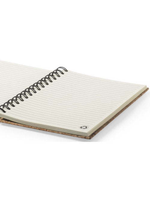 Natural cork A5 notebook open to show lined recycled paper pages and lay-flat spiral binding.