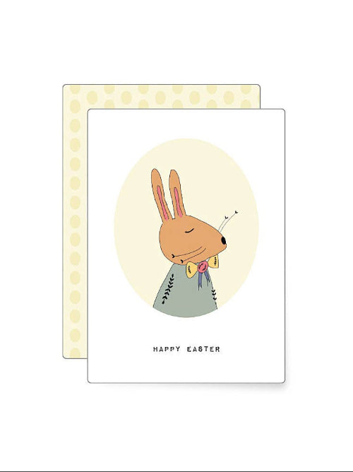 Sweet illustration of a dressed rabbit carrying a bundle of spring flowers over its shoulder, charming woodland Easter mini card with soft muted colours.