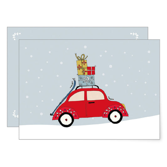 A charming illustrated Christmas Card featuring the classic Beetle Red car in the snow carrying a pile of Christmas gifts on the roof as there won't be space inside. 