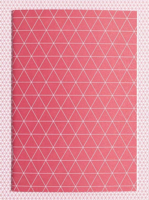 front cover of a red softcover notebook featuring triangular geometric design.