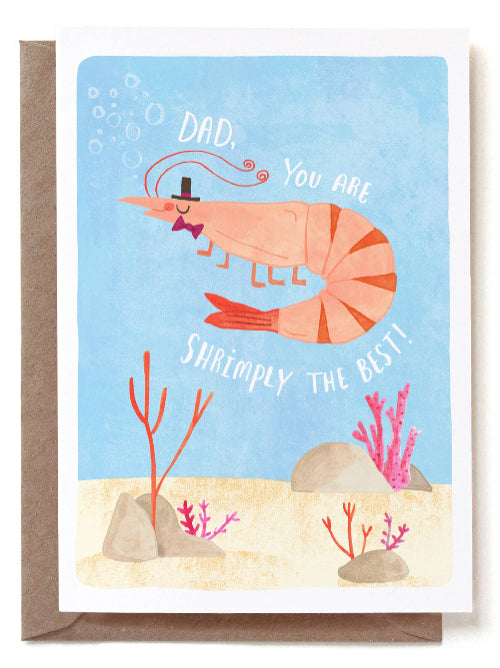 Greeting card with a shrimp illustration and text on a blue background saying "Dad, you are shrimply the best!".