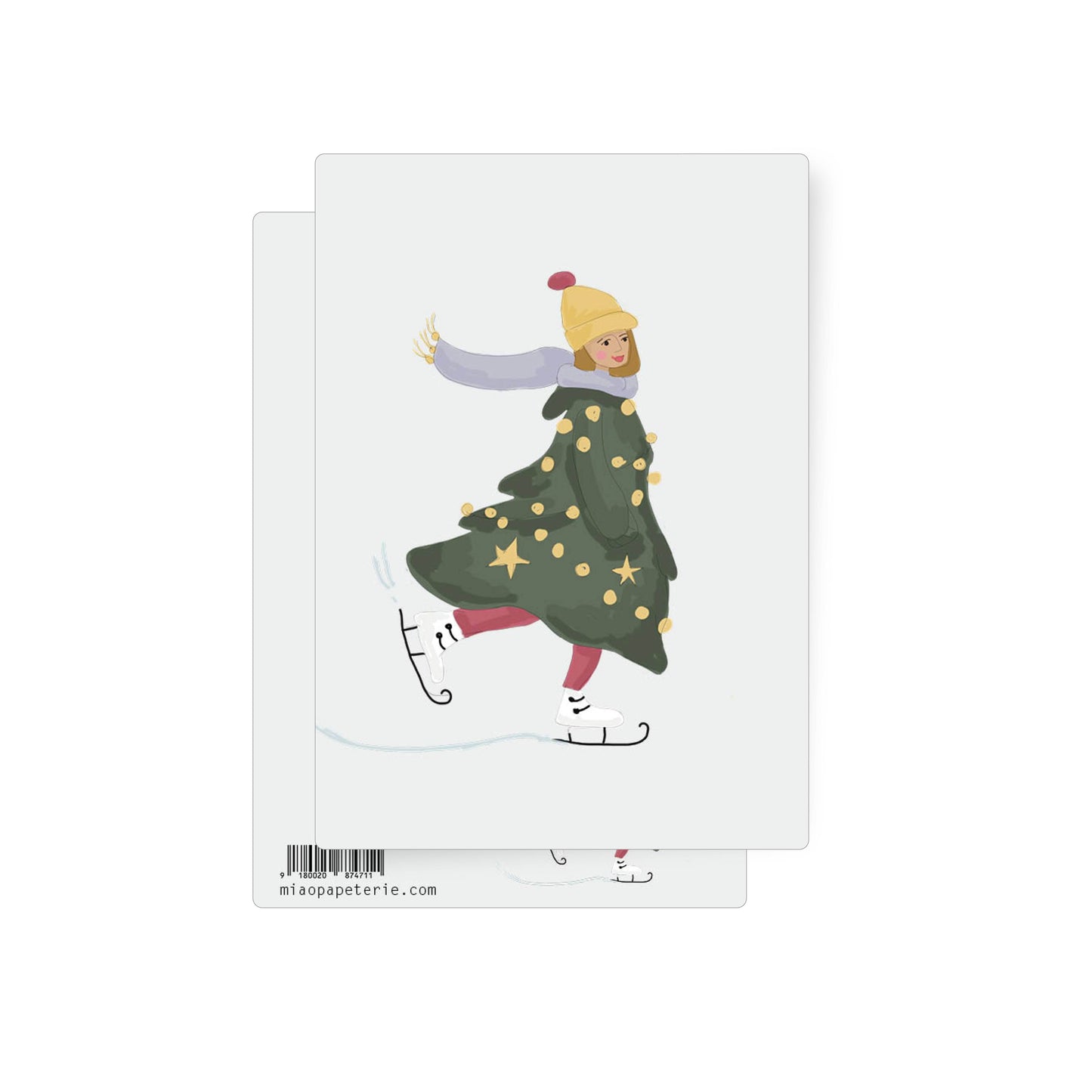 This postcard shows a girl ice-skating whilst wrapped up warmly in a big coat. The coat is green with gold Christmas decorations and it's shaped like a fir tree. 