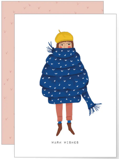 An illustrated greetings card with a lady wrapped up in an extra long scarf and the text "warm wishes". 