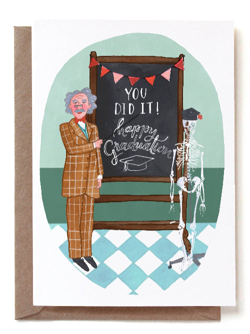 Graduation card with a man, skeleton, and chalkboard with 'You Did It! Happy Graduation' text.